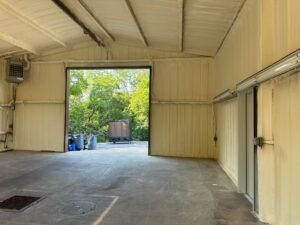 Warehouse Interior With Spray Foam Insulation On Walls And Ceiling.